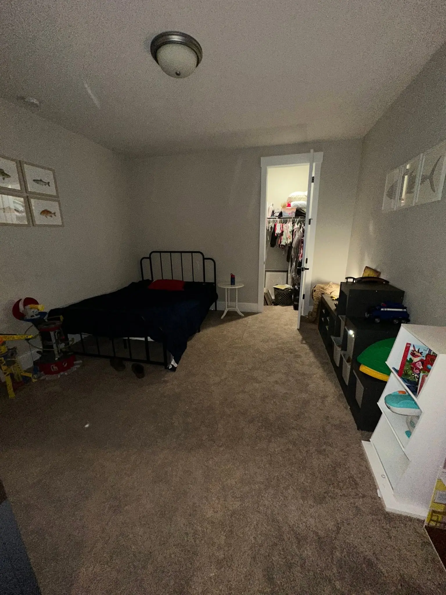 The same child bedroom with freshly vacuumed carpet and clear floor space after cleaning