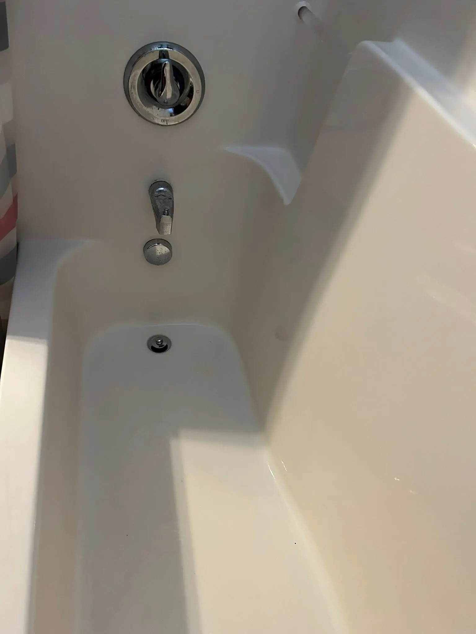 Bathtub restored to a bright white finish after deep cleaning